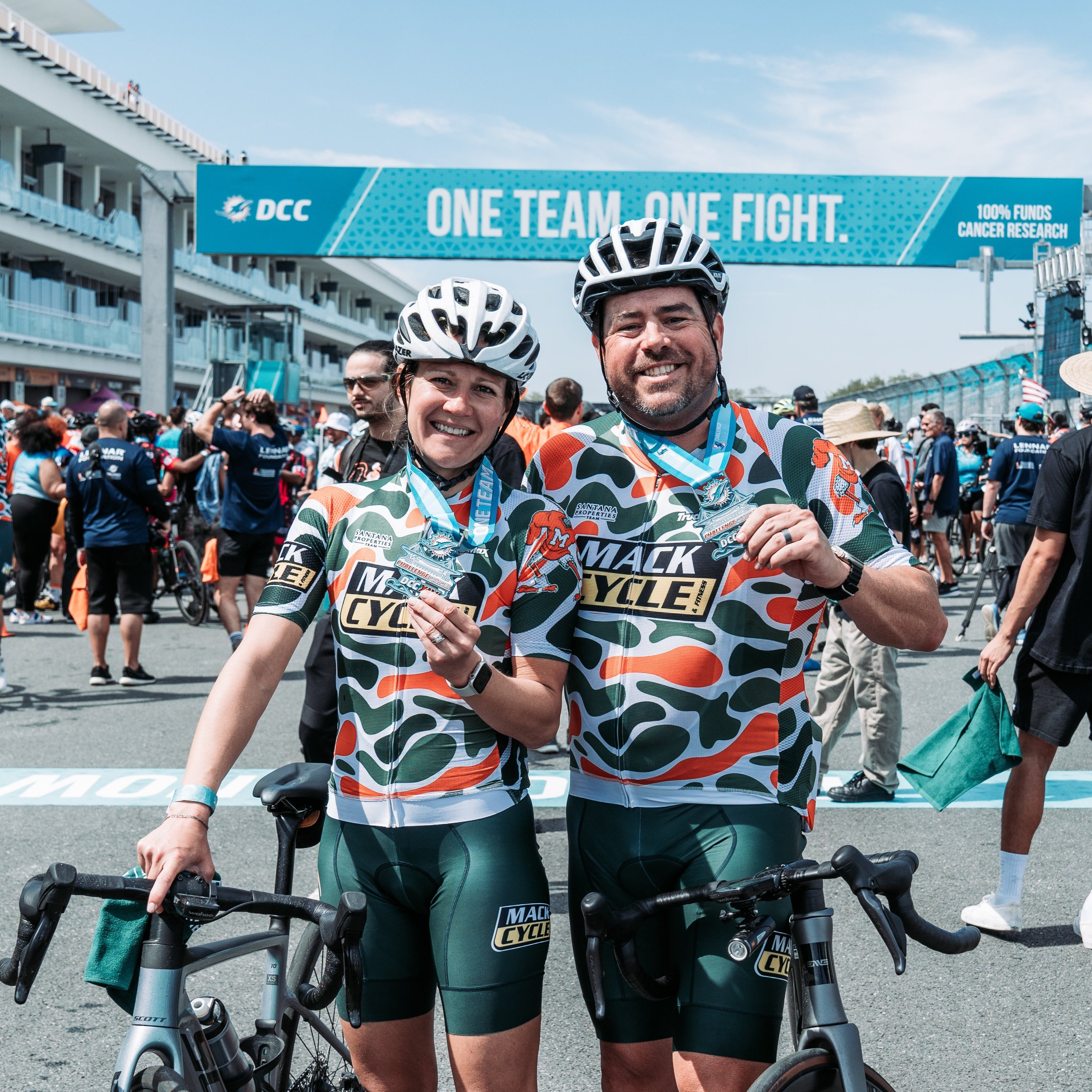 Shaun and Tennille Moore at the finish line after the DCXIV. Shaun Finished his 14th DCC 99 mile with Team Hurricanes Mack Cycle in a full Grand Prix Miami Style Race Track Experience